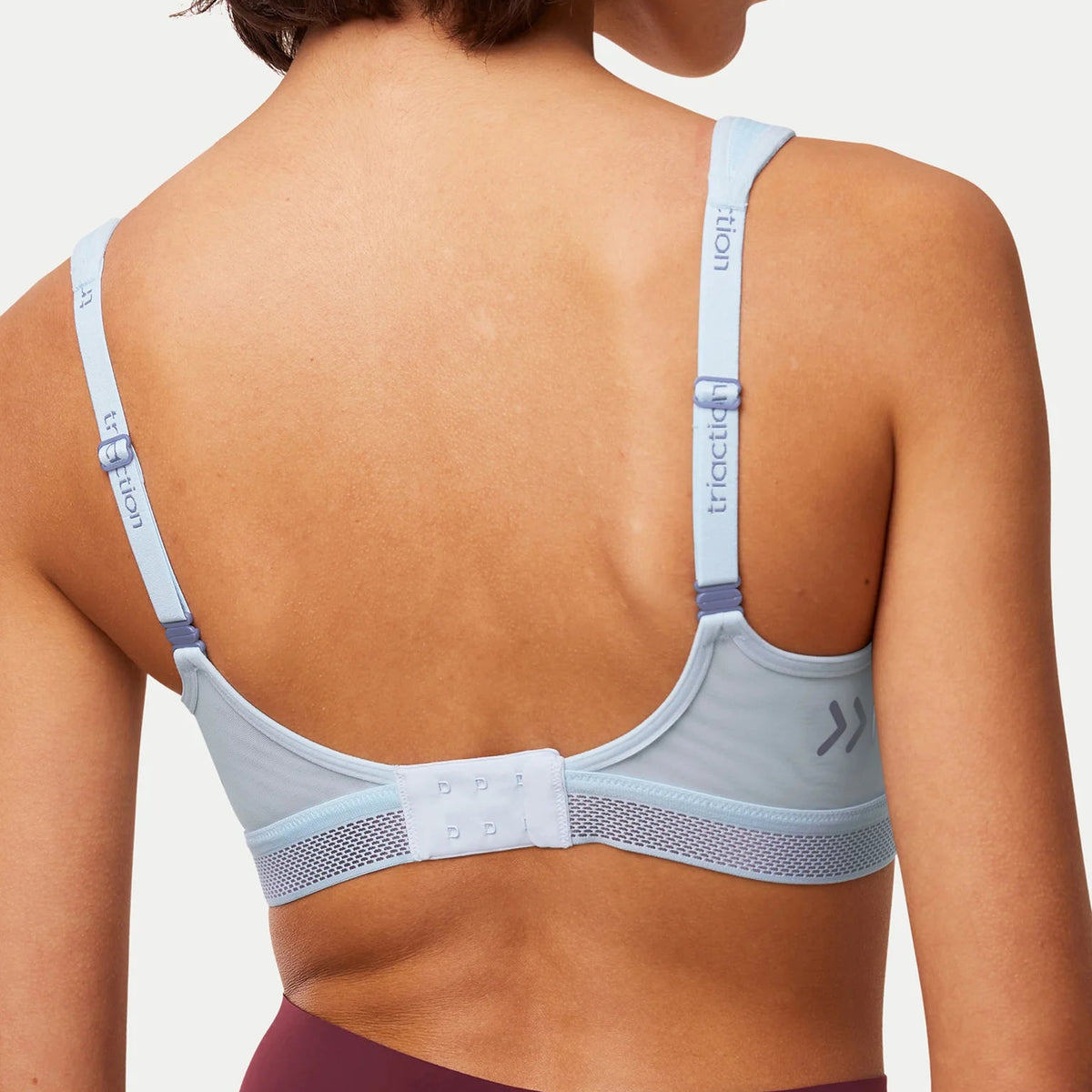 Mėlyna sportinė liemenėlė Triumph Triaction Cardio Flow P EX iš nugaros